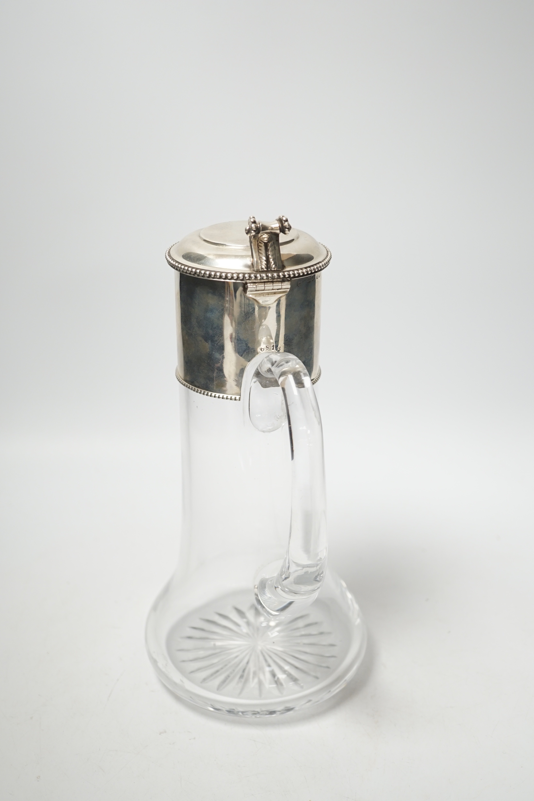 A Victorian silver mounted glass claret jug, John Wilmin Figg, London, 1868, 26.7cm.